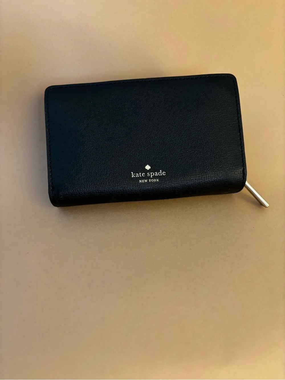kate spade black leather zip-around wallet with gold-tone zipper pull